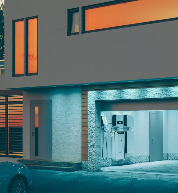 concept of a home battery energy storage system located in the garage of a modern family house in a futuristic blue light illuminating the evening atmosphere of a quiet street. 3d rendering.